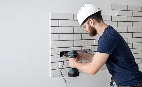 electricians in lake worth fl installing electrical sockets